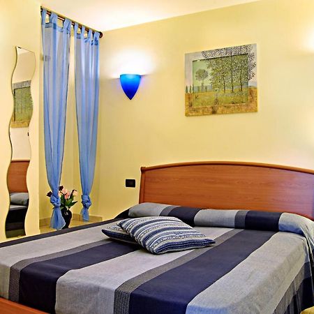 Апартаменты Residenza Costarossa Империя Экстерьер фото
